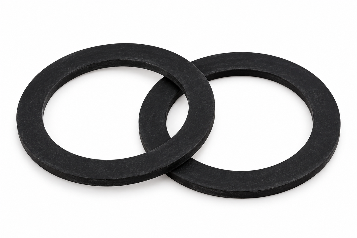 Pair of black 1½ inch EPDM rubber pump union washers on a plain white background